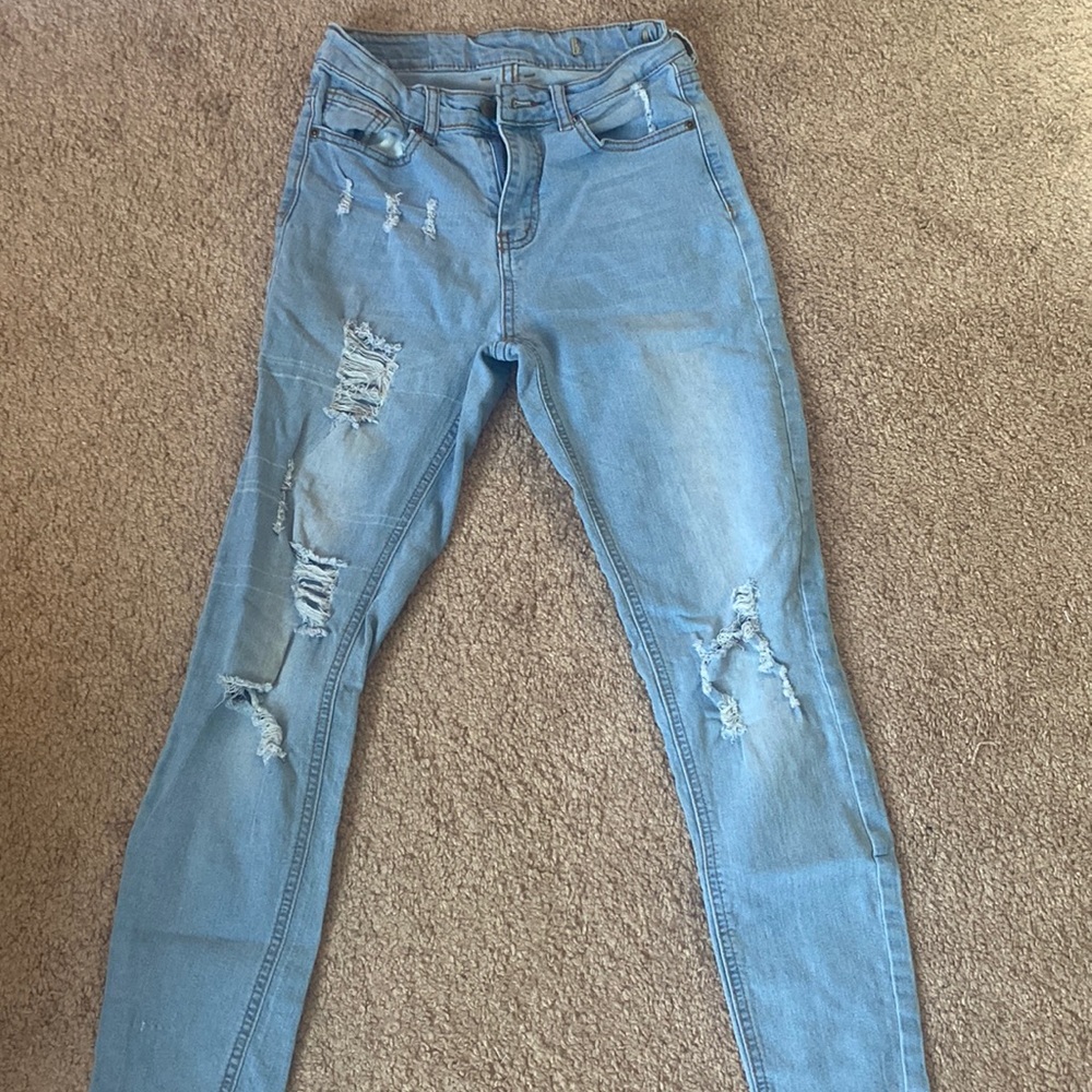 Blue ripped skinny jeans